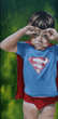 little boy dressed as superman